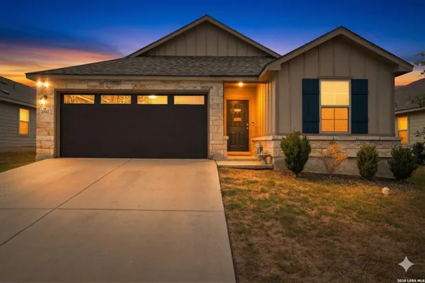 a front view of a house with a outdoor space