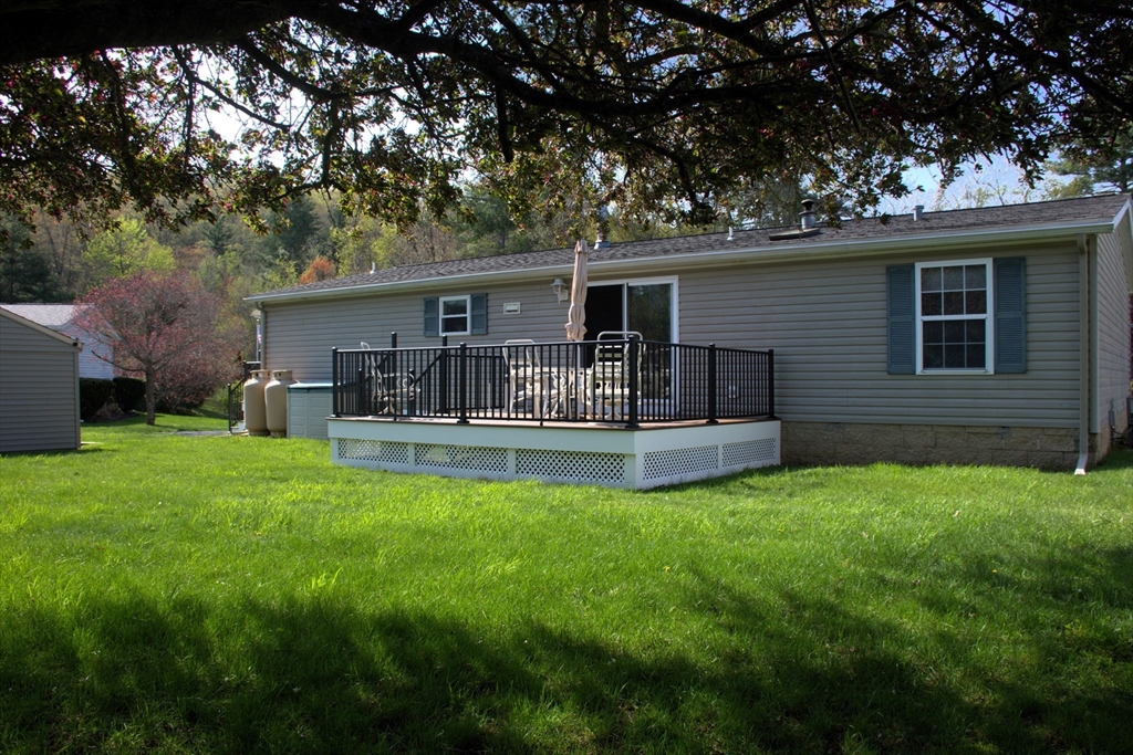 20 Deer Run Brookfield, MA 01506 - Photo 28 of 29 a house view with a sitting space and garden