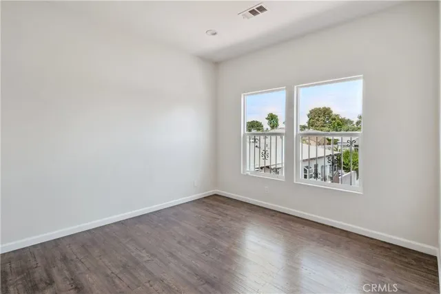 a bathroom with a double vanity sink and mirror