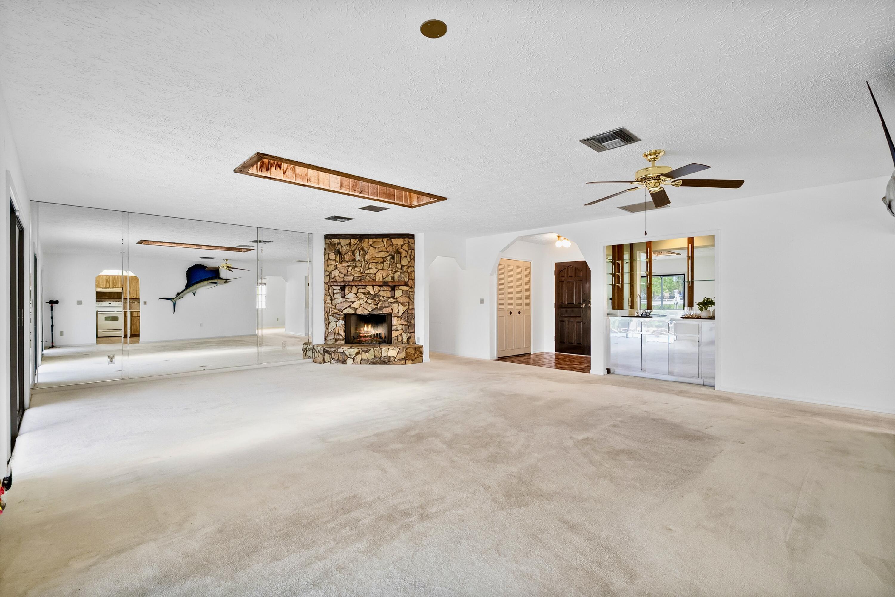 1545 Southwest Dyer Point Road Palm City, FL 34990 - Photo 15 of 44 Great Room-open, bright, and spacious.