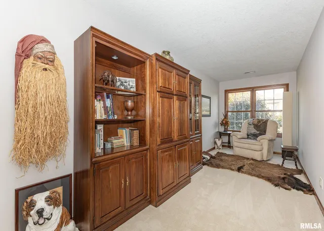 a bathroom with a sink toilet vanity and shower