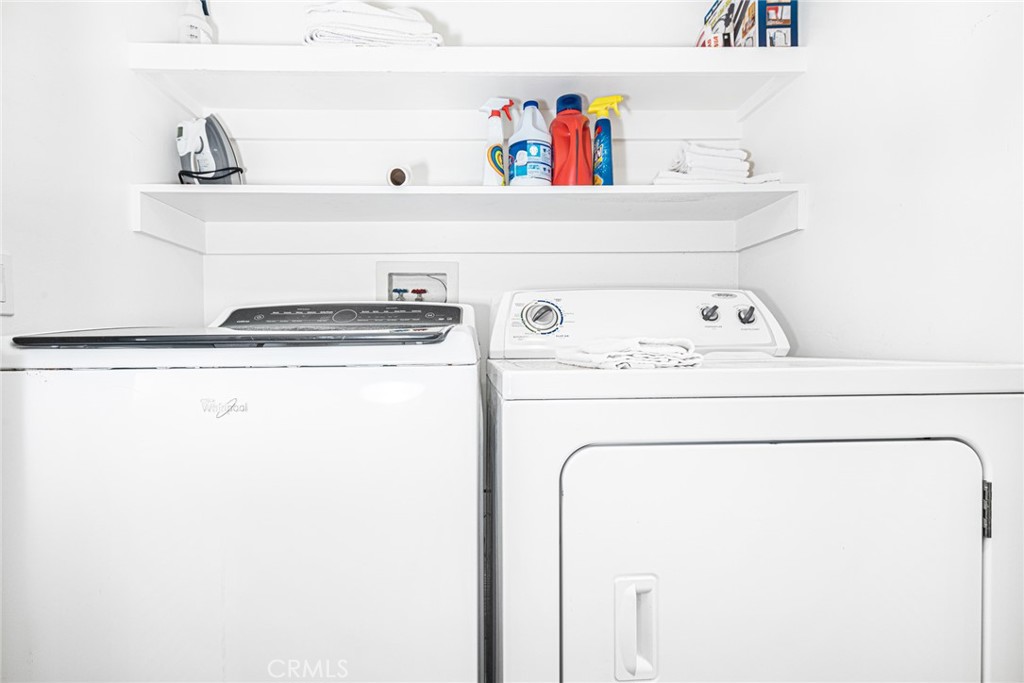1720 West Oceanfront, Unit B Newport Beach, CA 92663 - Photo 8 of 28 a utility room with dryer and washer