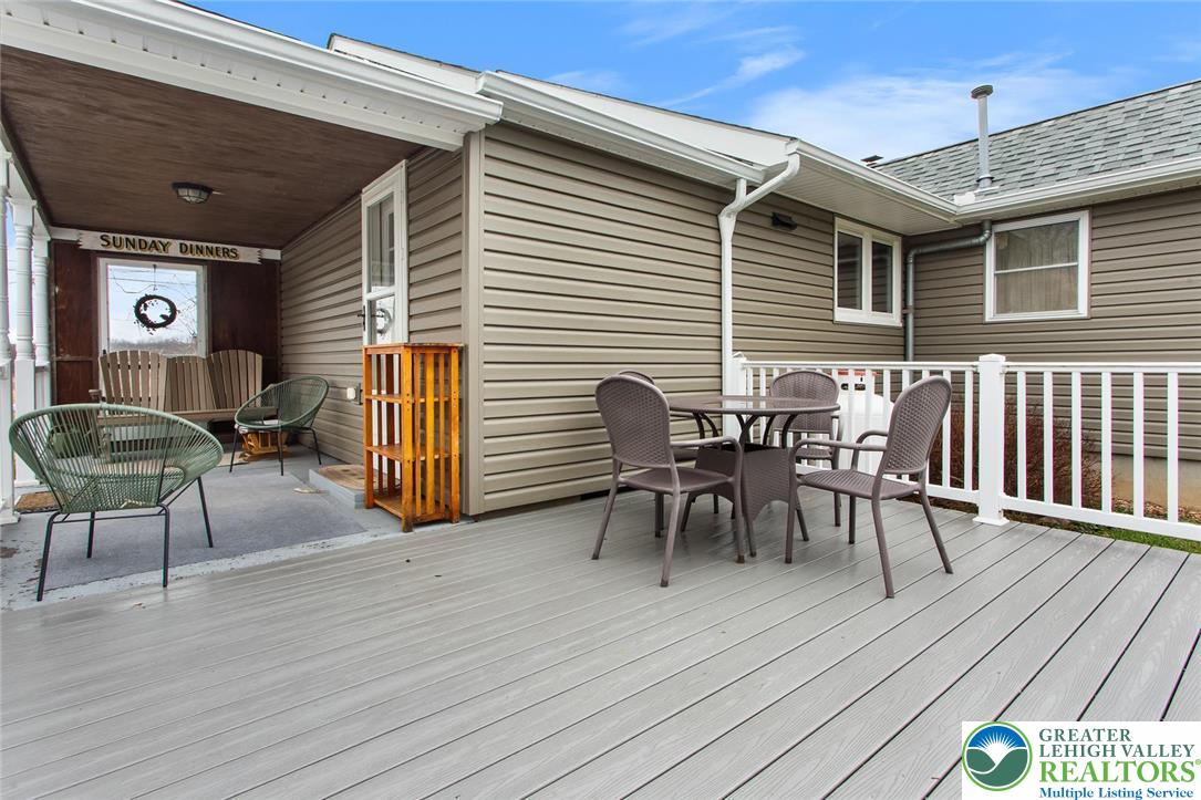 254 Old Allentown Road Wind Gap, PA 18091 - Photo 13 of 20 a view of a dinning table and chairs in patio of the house