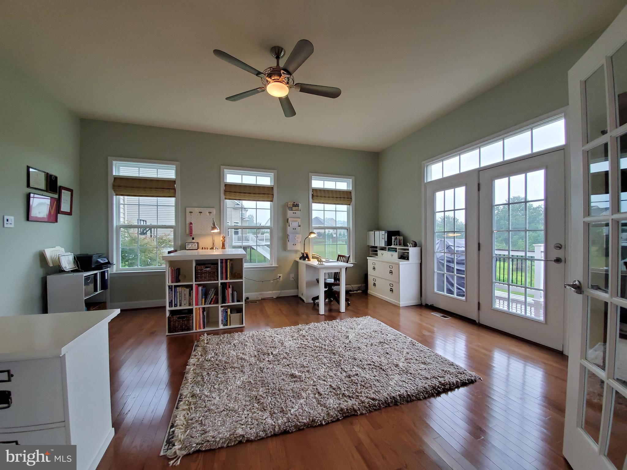 41882 Scotchbridge Place Ashburn, VA 20148 - Photo 13 of 89 Sunroom with transom windows & doors.