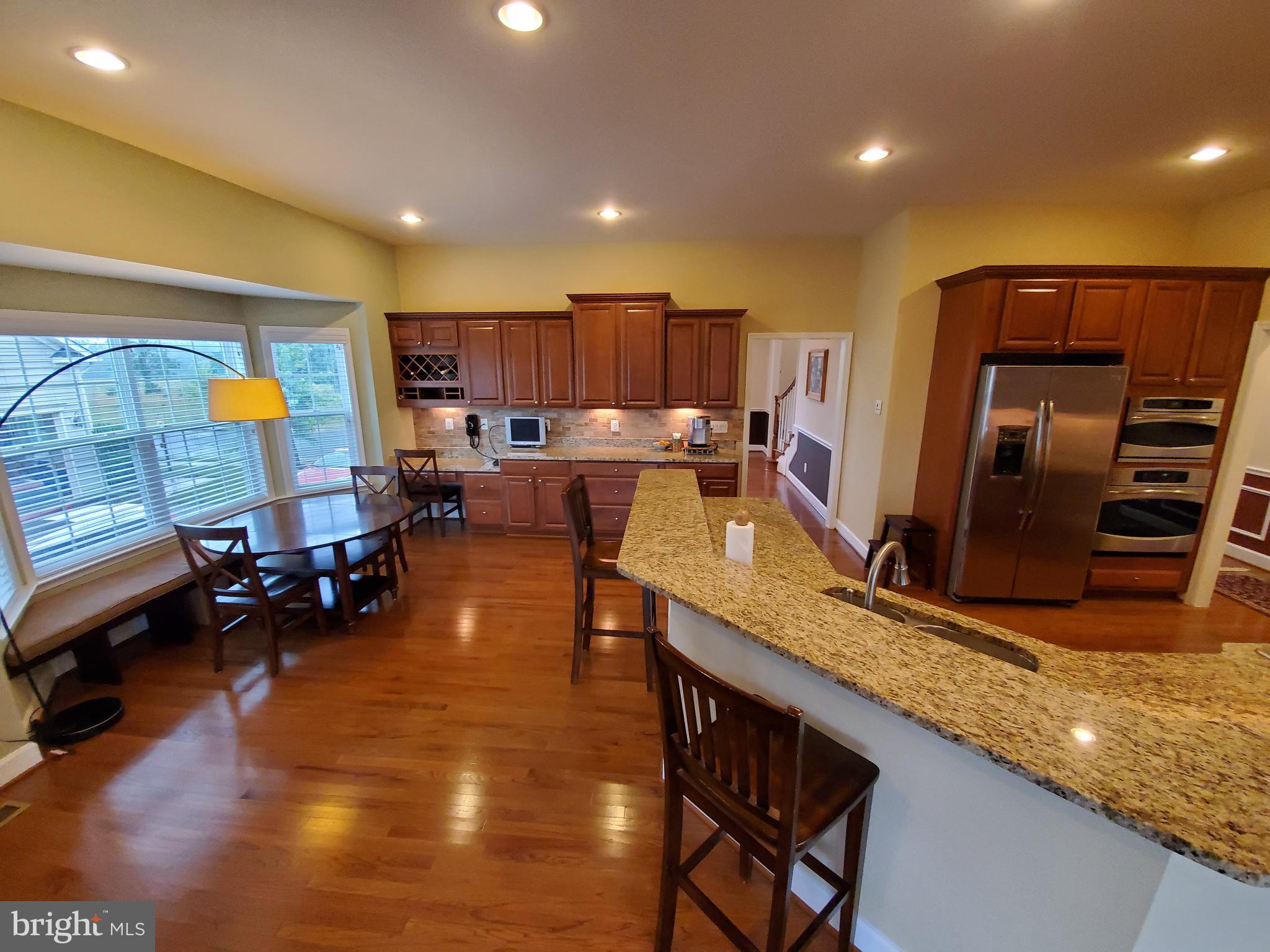 41882 Scotchbridge Place Ashburn, VA 20148 - Photo 17 of 89 Breakfast area with bay window and bench.
