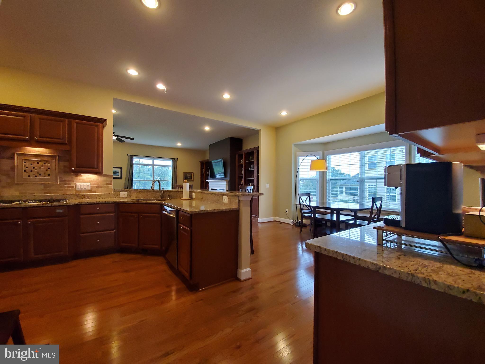 41882 Scotchbridge Place Ashburn, VA 20148 - Photo 20 of 89 Lots of counter space for meal prep and serving.