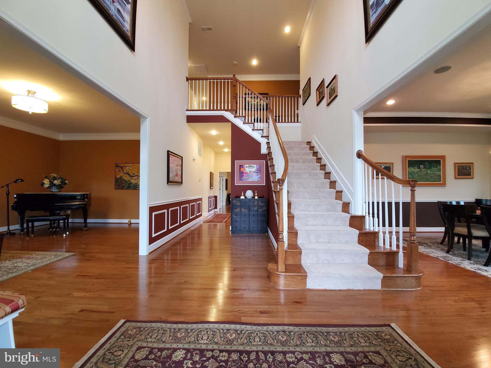 41882 Scotchbridge Place Ashburn, VA 20148 - Photo 3 of 89 Spacious and bright two story foyer welcomes you.