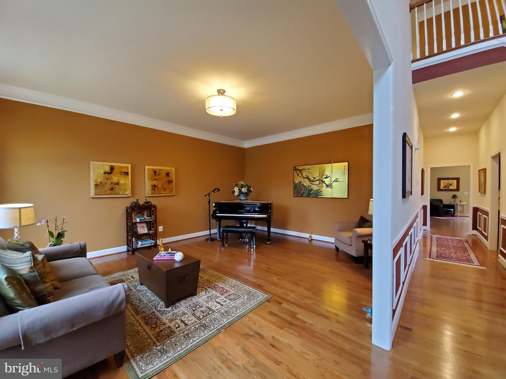 41882 Scotchbridge Place Ashburn, VA 20148 - Photo 4 of 89 Living / Piano room. Can you hear the music?