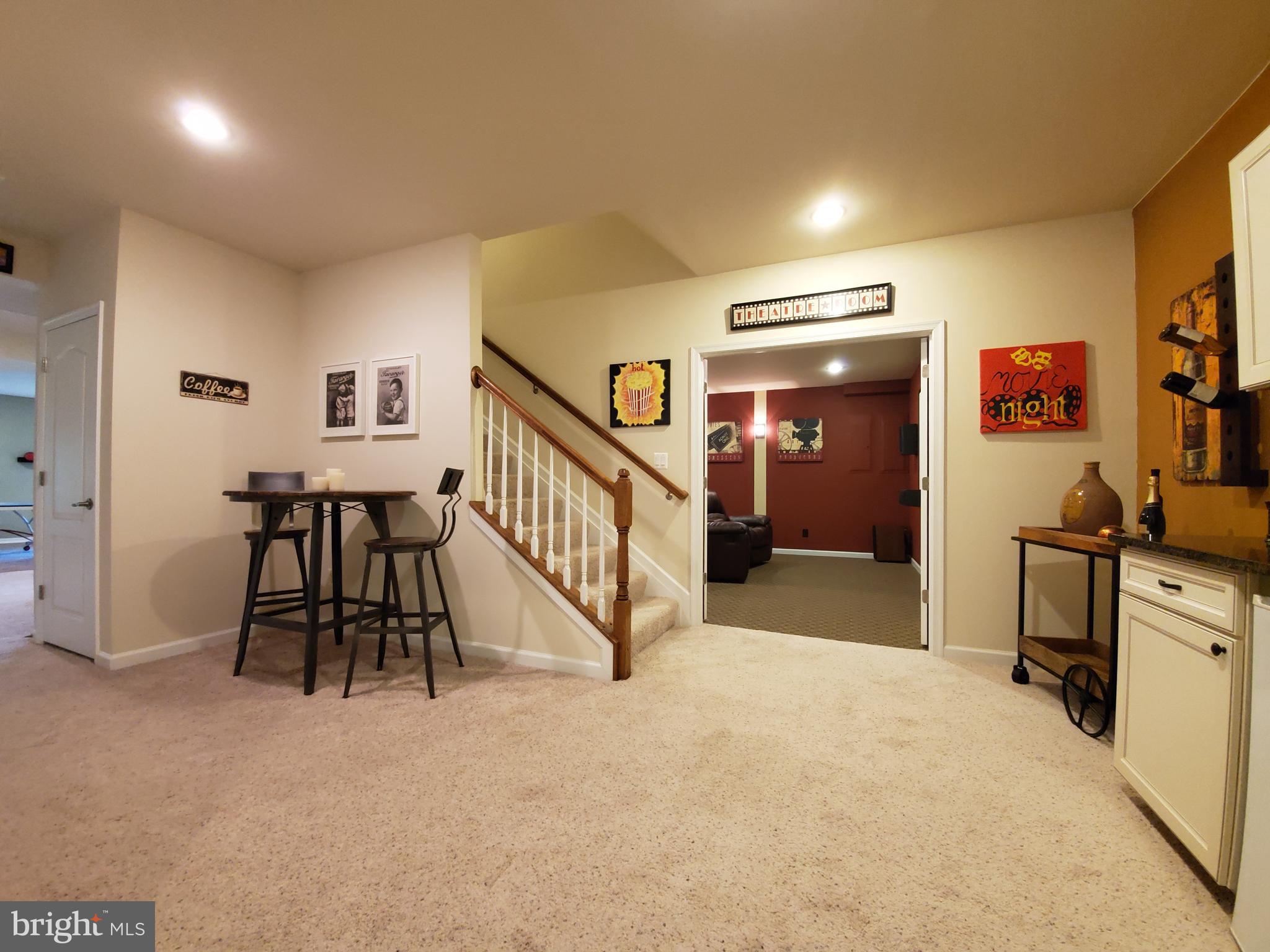 41882 Scotchbridge Place Ashburn, VA 20148 - Photo 51 of 89 Grad a drink, pop some corn and watch a movie!