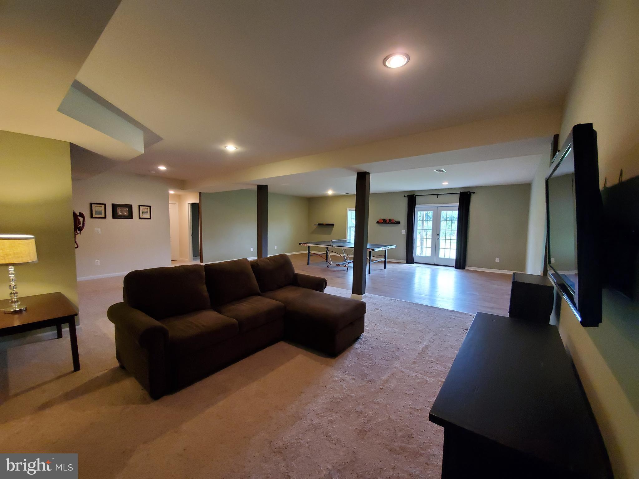 41882 Scotchbridge Place Ashburn, VA 20148 - Photo 61 of 89 Let them play pong. I'm a gamer. This is my spot.