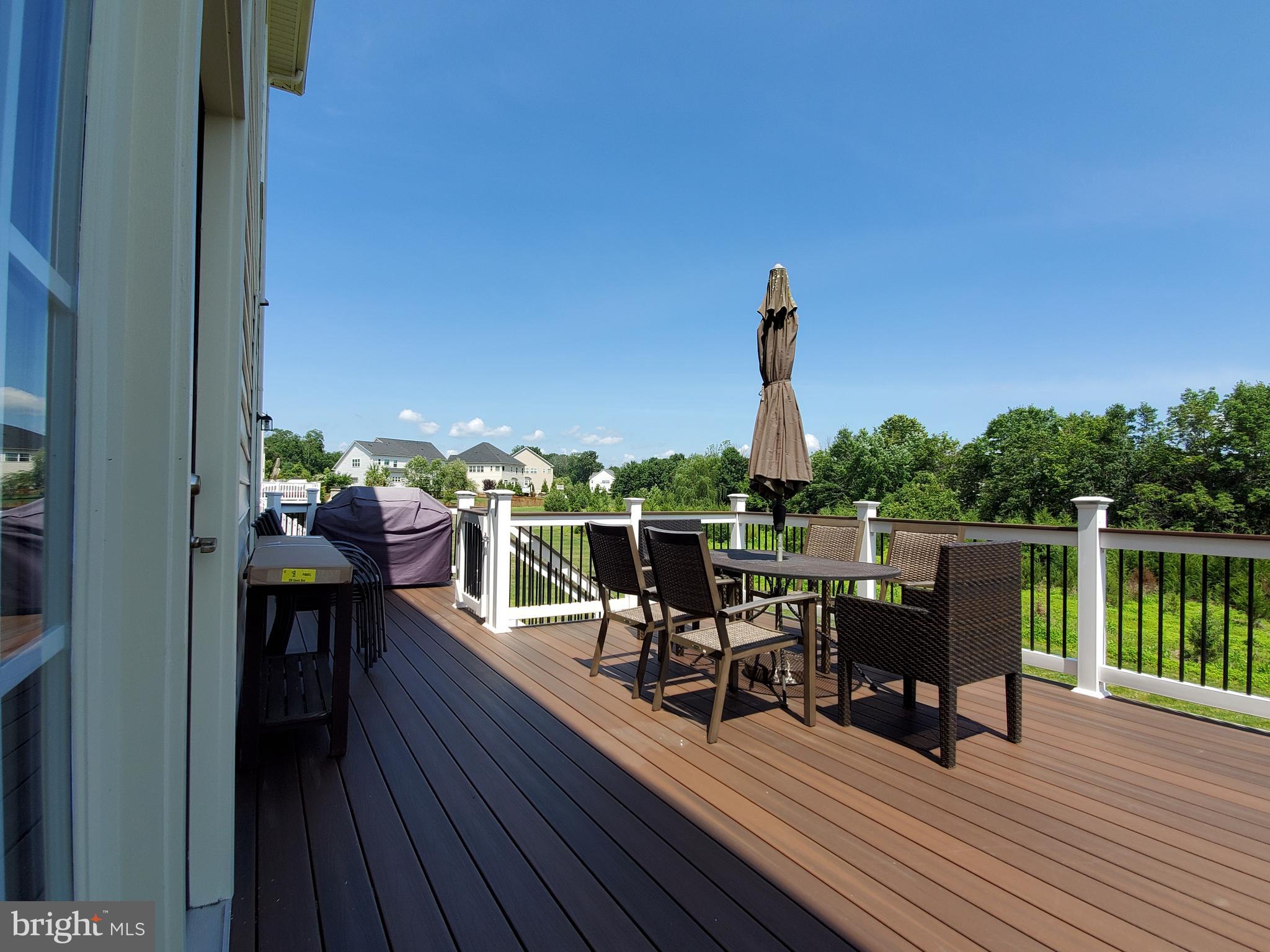 41882 Scotchbridge Place Ashburn, VA 20148 - Photo 65 of 89 Nice care-free deck backs to open space.