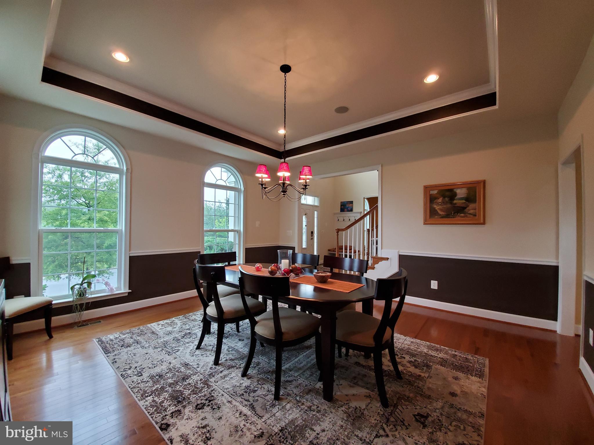 41882 Scotchbridge Place Ashburn, VA 20148 - Photo 9 of 89 Large dining room with tray ceiling.