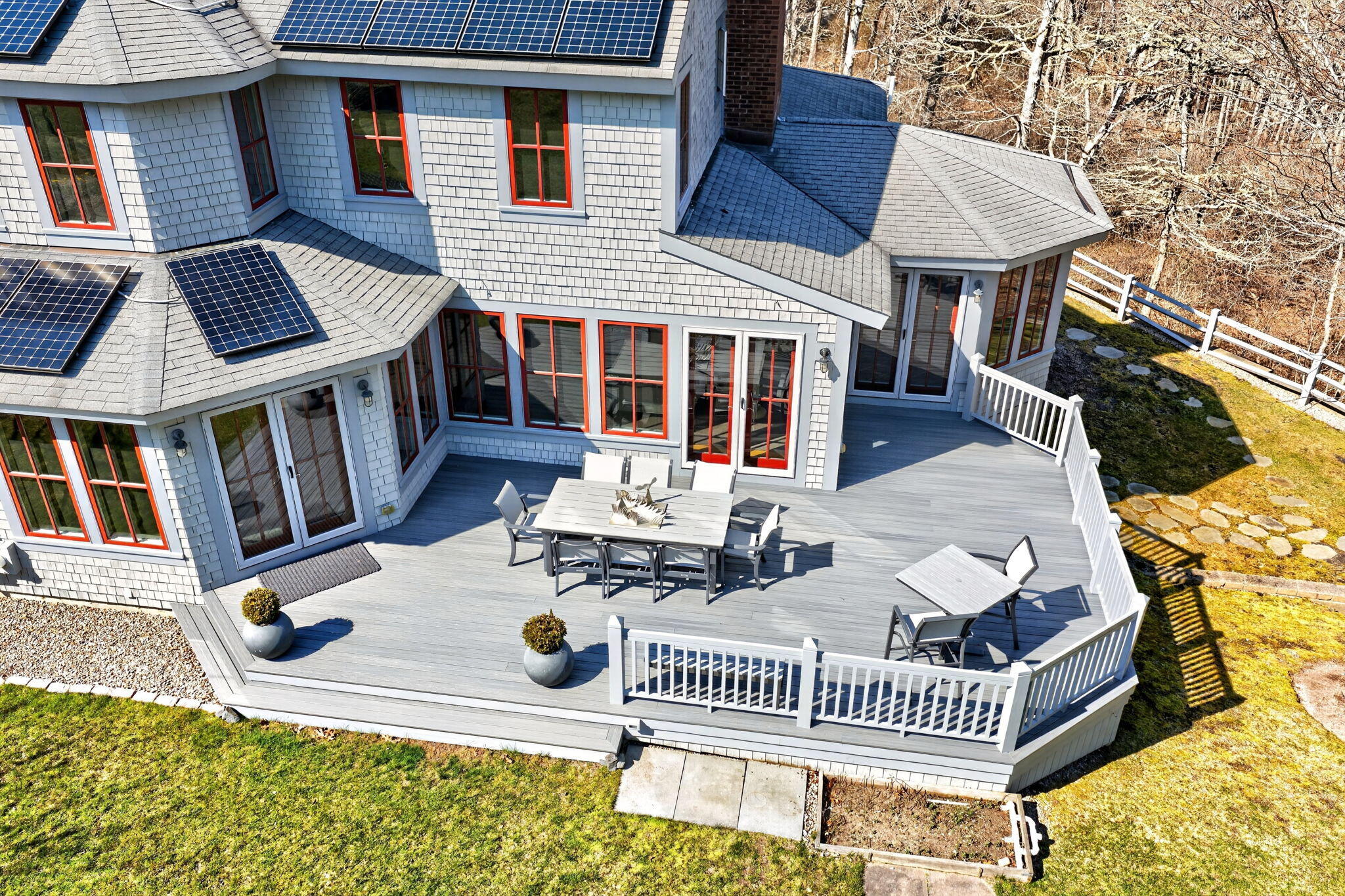 35 Northgate Road North Chatham, MA 02650 - Photo 23 of 75 a view of a patio with couches chairs and wooden floor