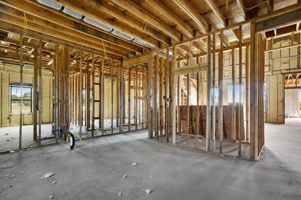 2463 County Road Bonham, TX 75418 - Photo 16 of 29 a view of a room with wooden walls