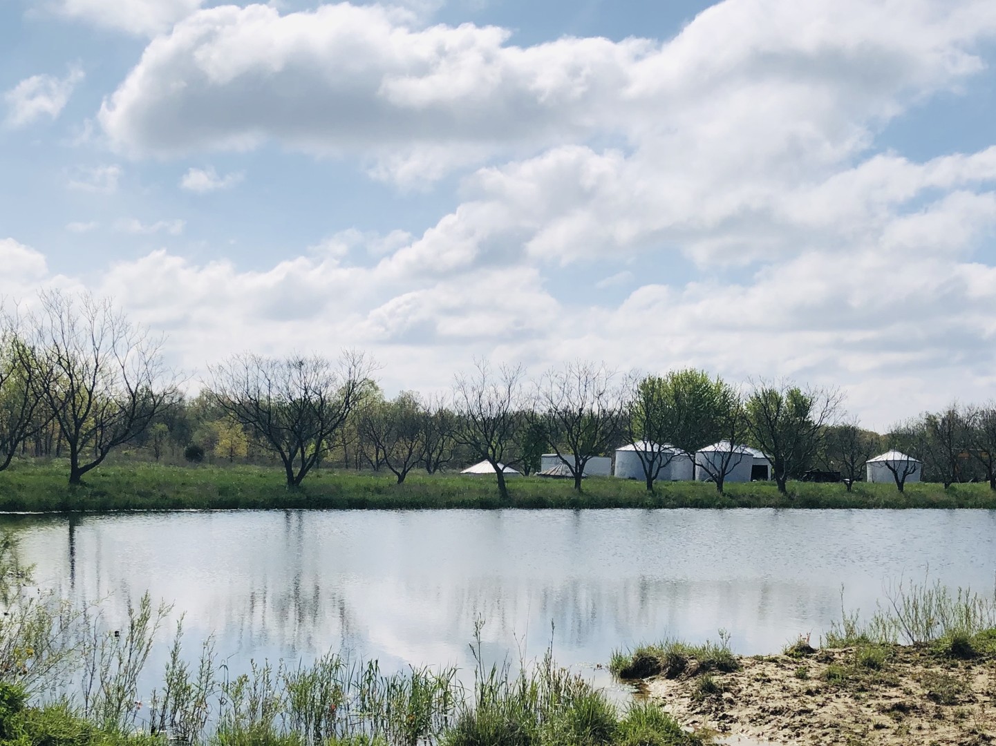 5200 Seven Hills Road Clinton, IL 61727 - Photo 11 of 19 a view of a lake with a big yard
