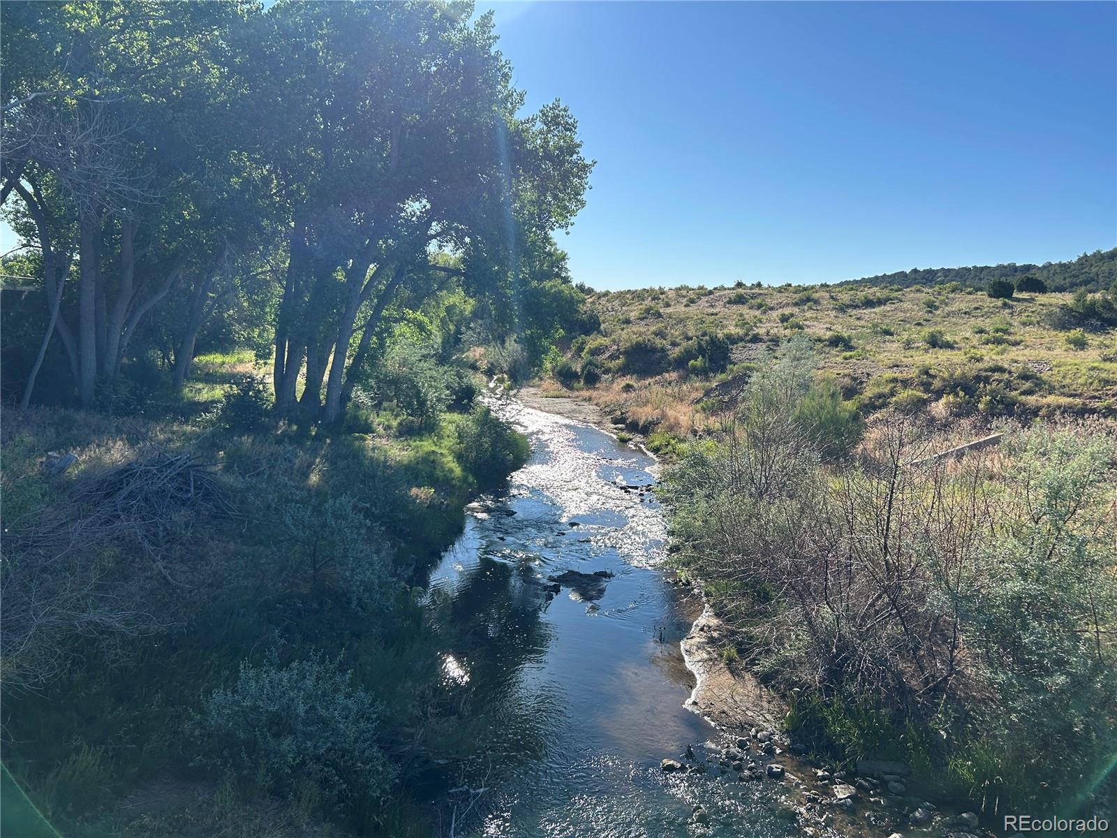Tract B Tract B City Ranch Walsenburg, CO 81089 - Photo 1 of 32 a view of a yard with wooden fence