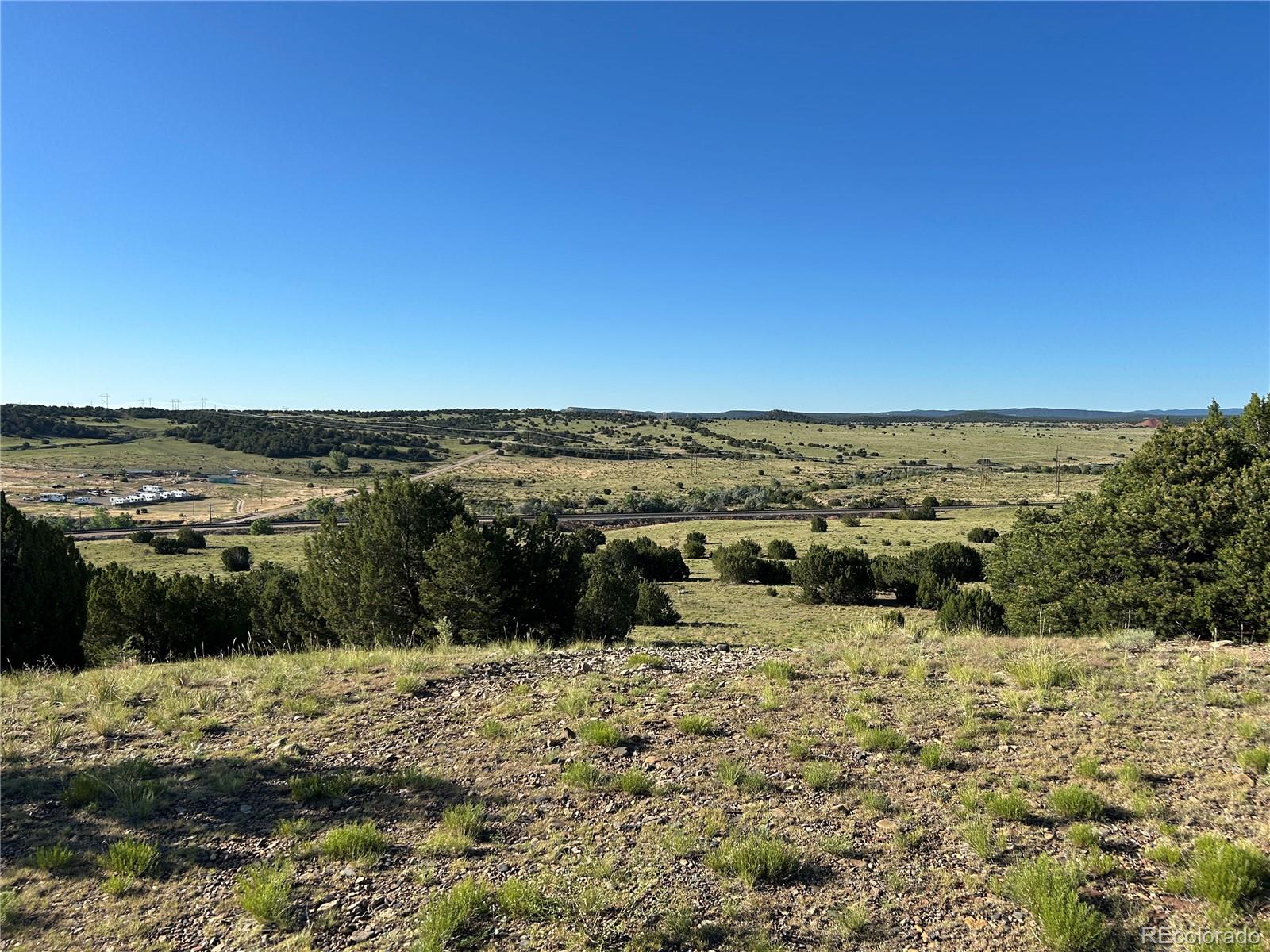 Tract B Tract B City Ranch Walsenburg, CO 81089 - Photo 19 of 32 a view of a lake with beach