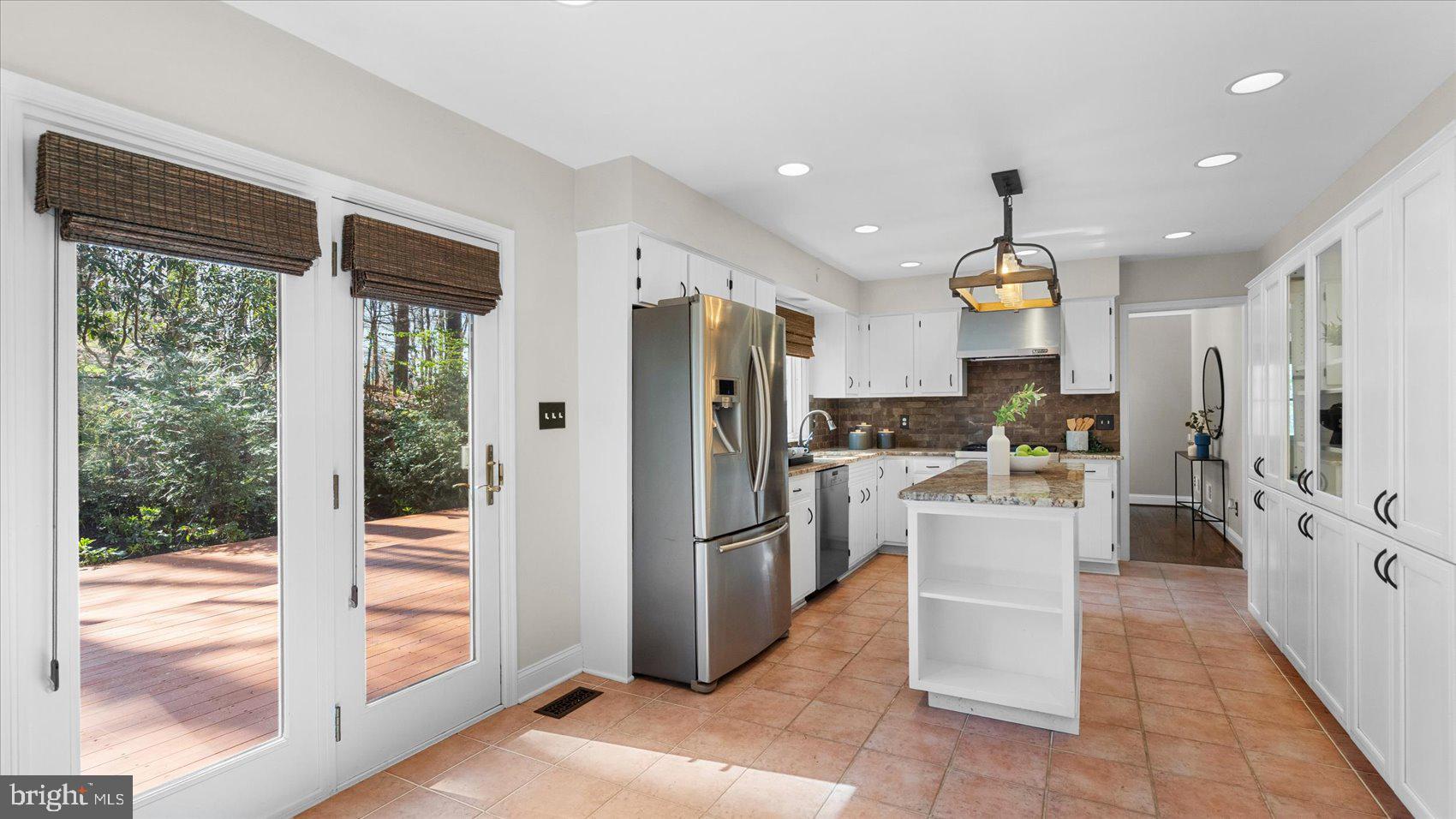 9 Nantucket Garth Phoenix, MD 21131 - Photo 17 of 52 a kitchen with stainless steel appliances a refrigerator and a stove top oven