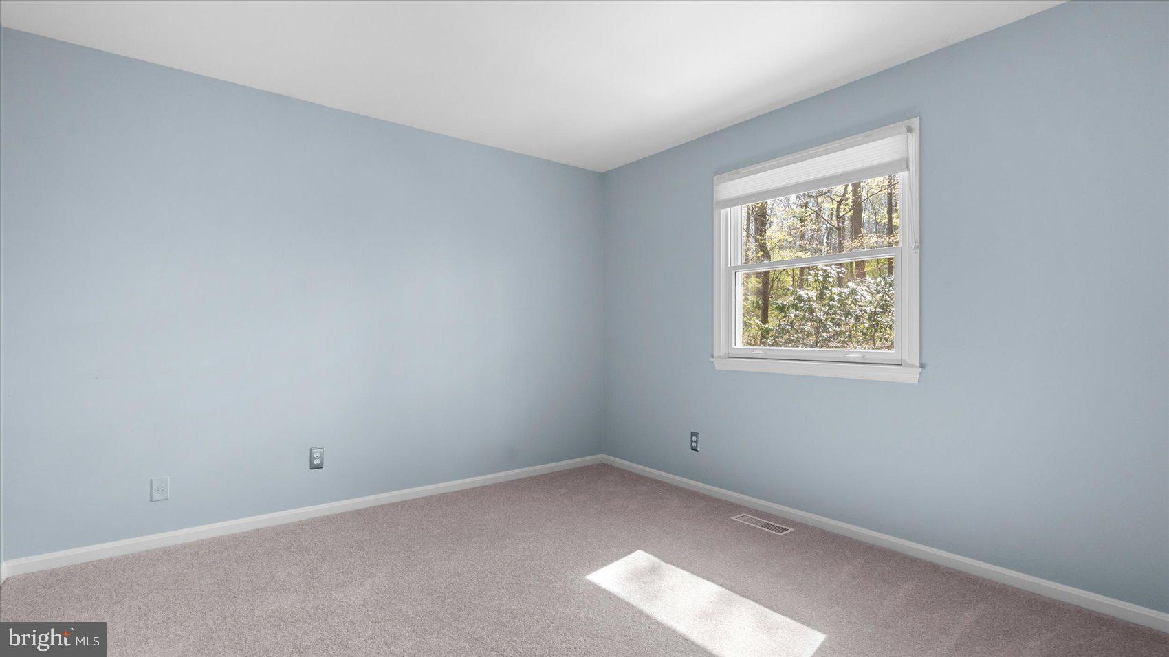 9 Nantucket Garth Phoenix, MD 21131 - Photo 32 of 52 an empty room with a window