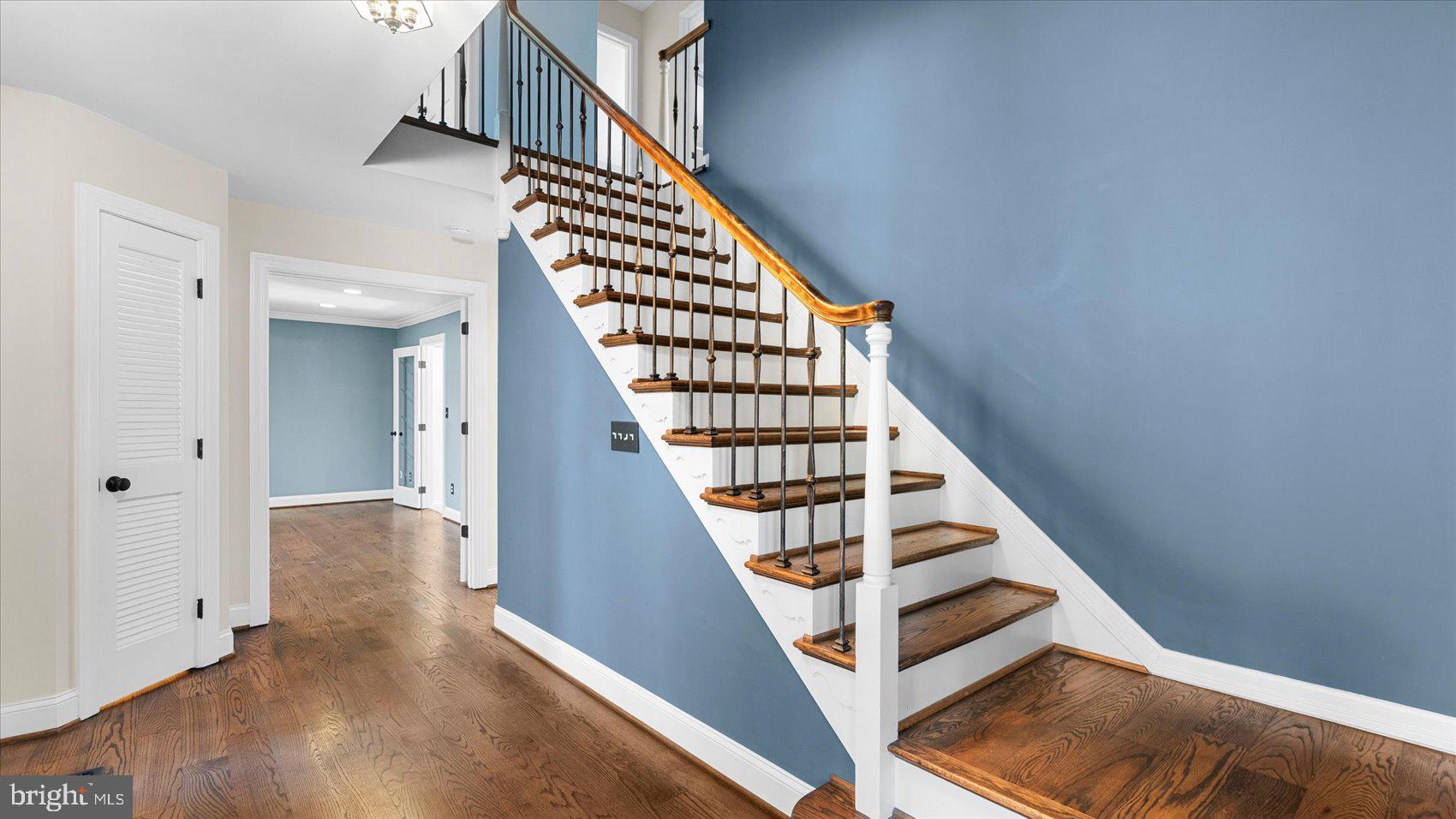 9 Nantucket Garth Phoenix, MD 21131 - Photo 4 of 52 a view of entryway and hall with wooden floor