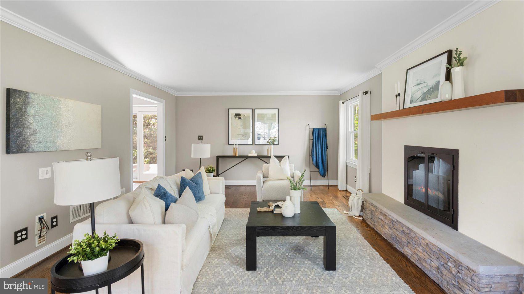 9 Nantucket Garth Phoenix, MD 21131 - Photo 7 of 52 a living room with furniture and a fireplace