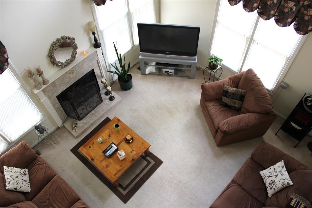 5316 Bentgrass Drive Raleigh, NC 27610 - Photo 13 of 25 Here is where you can appreciate that this home has a two story family room that creates a huge sense of volume in this home.