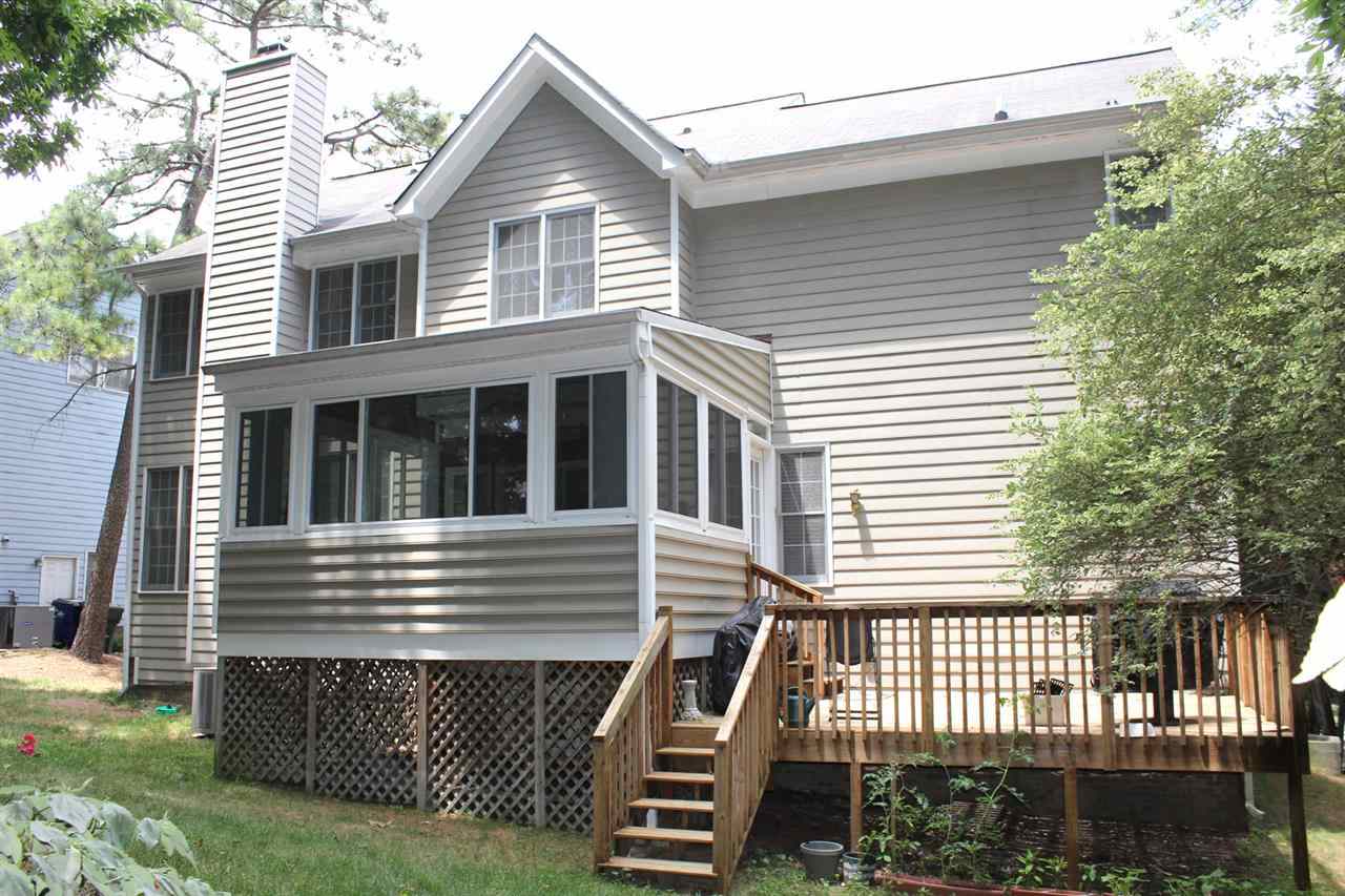 5316 Bentgrass Drive Raleigh, NC 27610 - Photo 20 of 25 Note the sunroom and spacious deck.