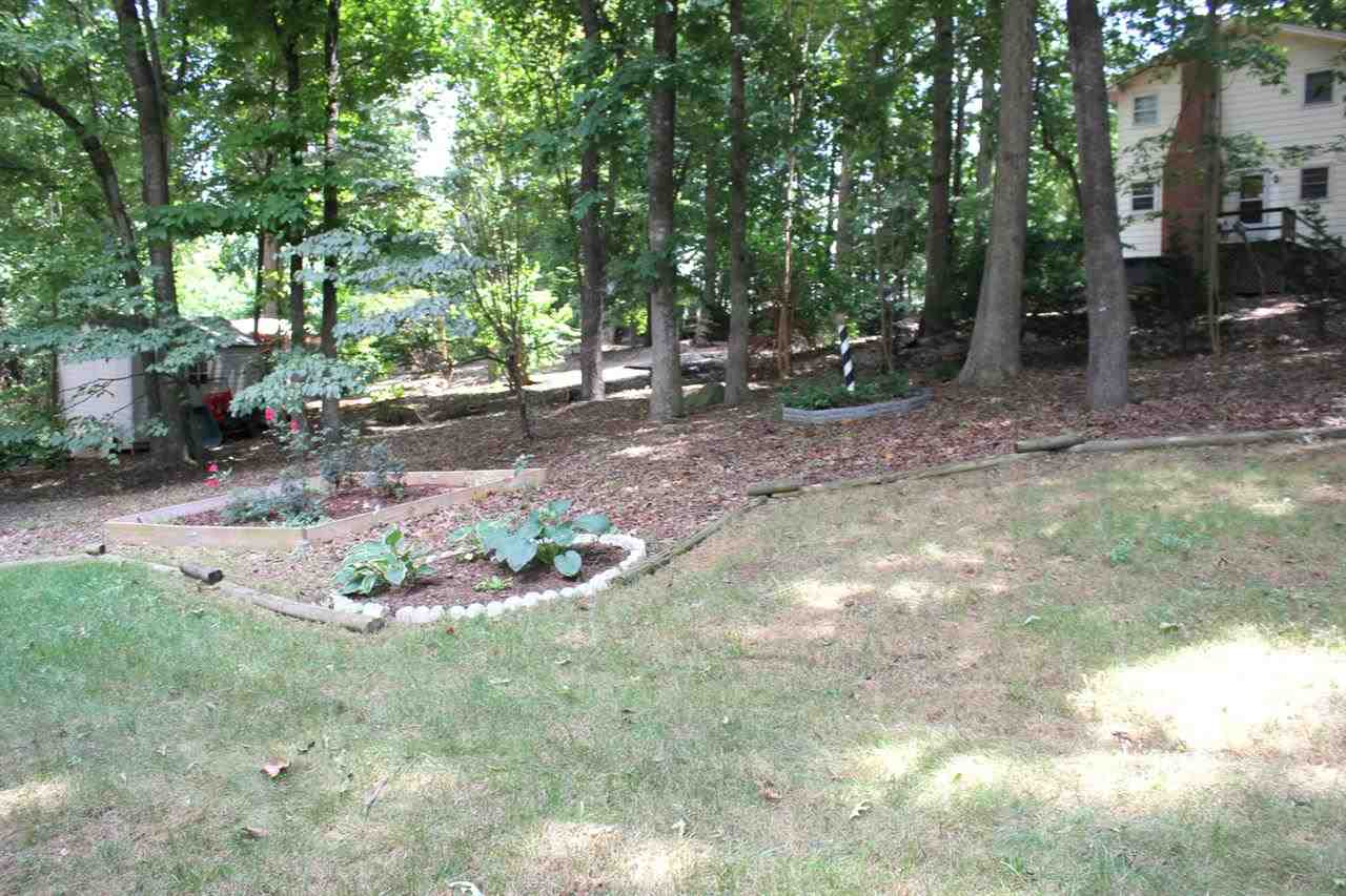 5316 Bentgrass Drive Raleigh, NC 27610 - Photo 21 of 25 A fringe of trees gives you privacy from your neighbors.