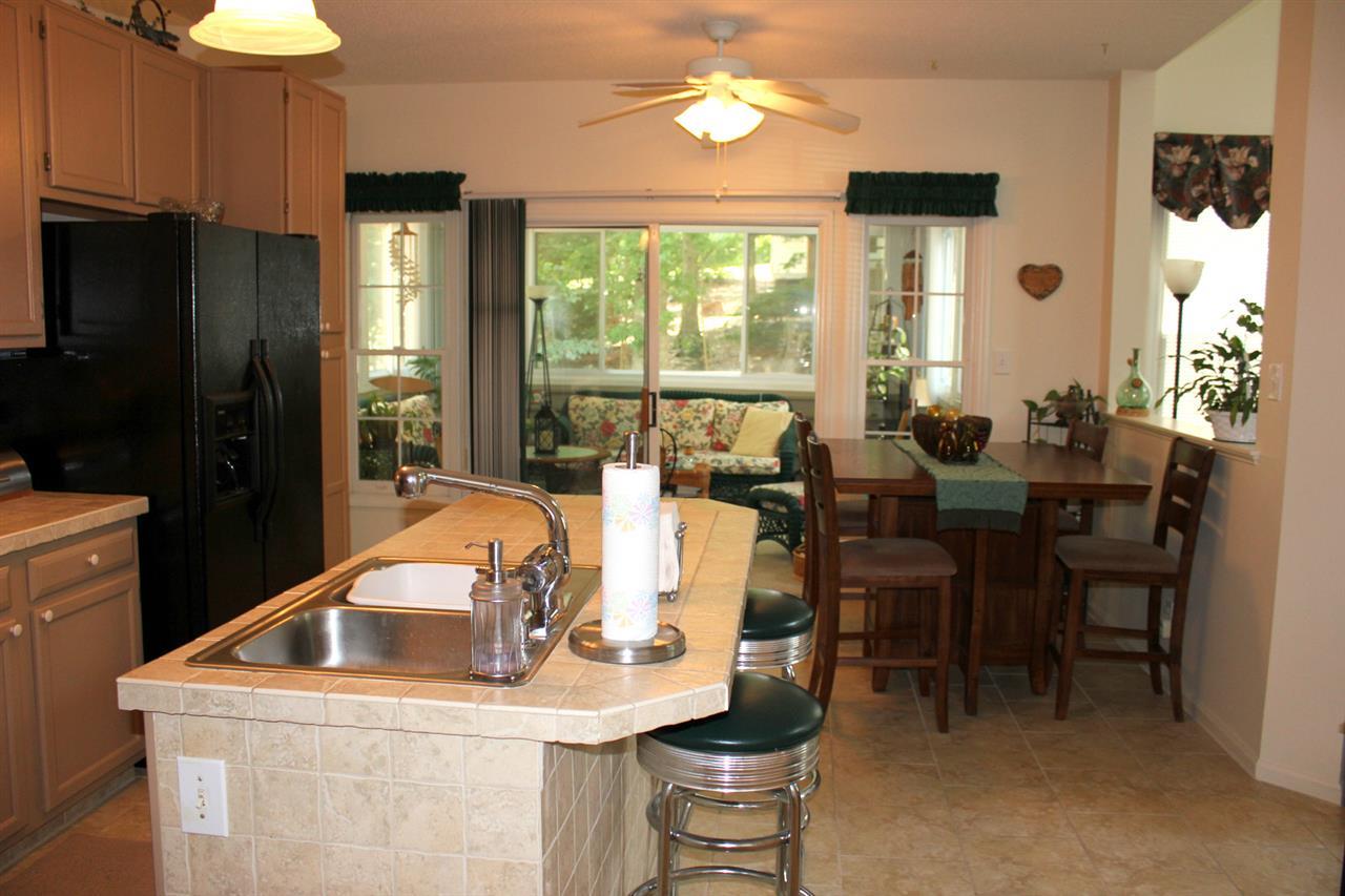 5316 Bentgrass Drive Raleigh, NC 27610 - Photo 10 of 25 You can easily see that this is a spacious kitchen that can easily accommodate a couple cooking dinner side by side.