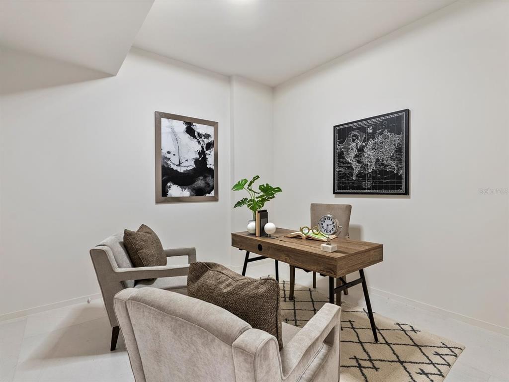 1020 Sunset Point Road, Unit 605 Clearwater, FL 33755 - Photo 15 of 35 a view of a livingroom with furniture and window