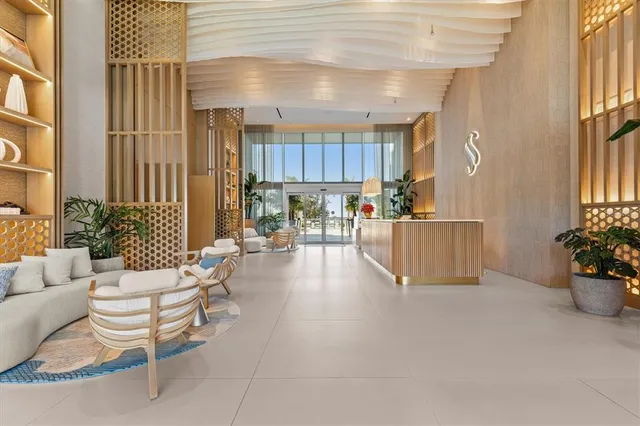 a view of a building with sitting area