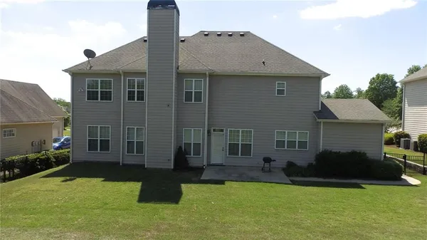 a picture of a bathroom with a shower