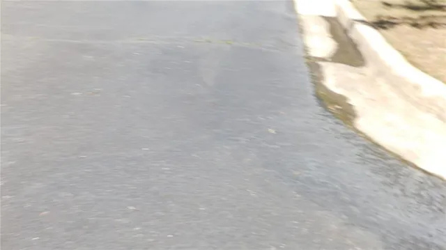 a view of a house with swimming pool and sitting area