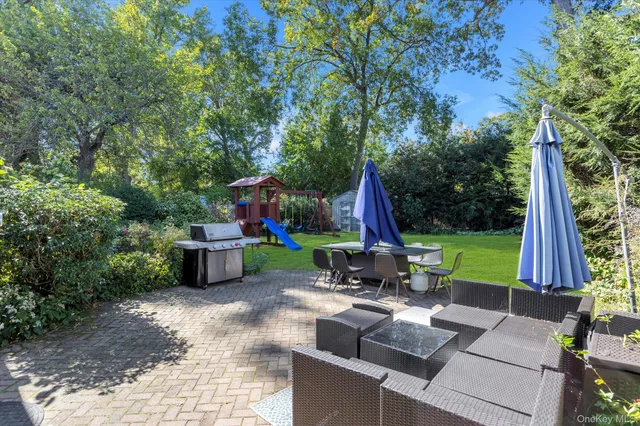 a view of garden with patio