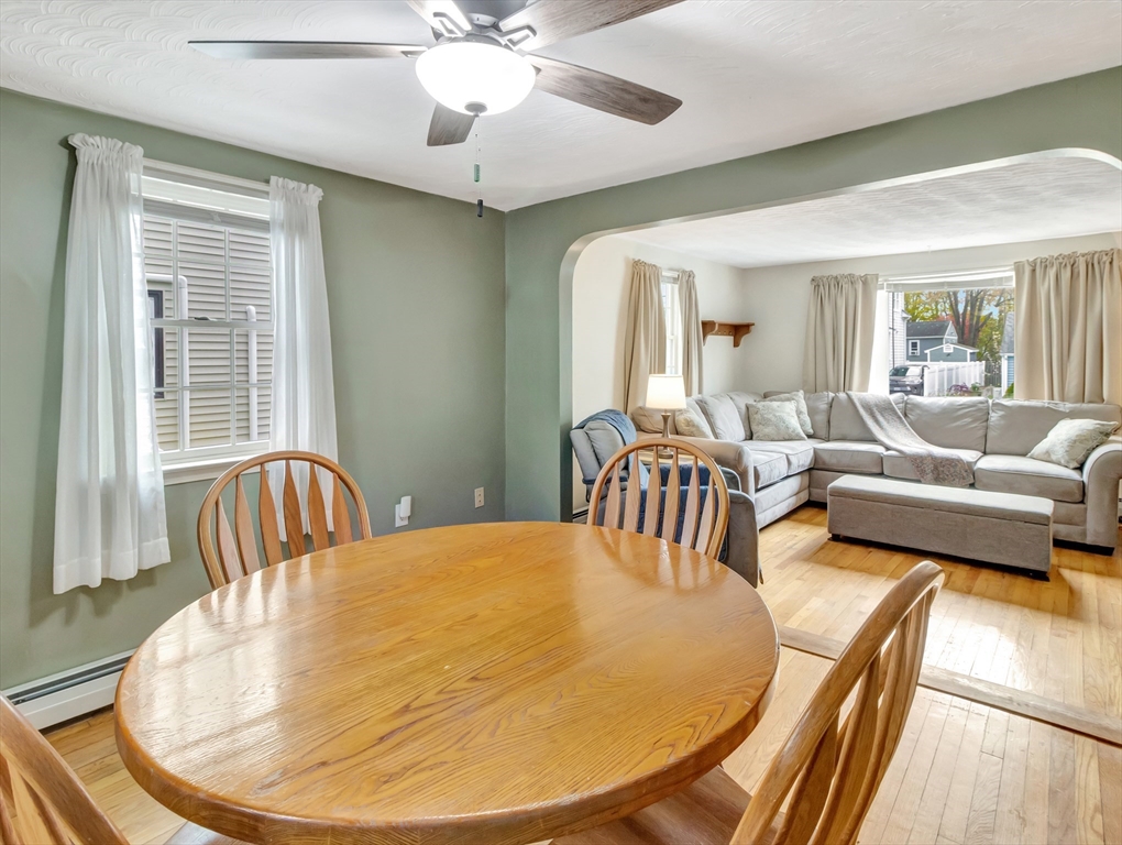 5 G Street Hull, MA 02045 - Photo 14 of 41 a view of a dining room with furniture and wooden floor