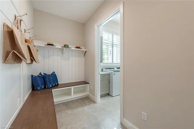 a view of walk in closet with window
