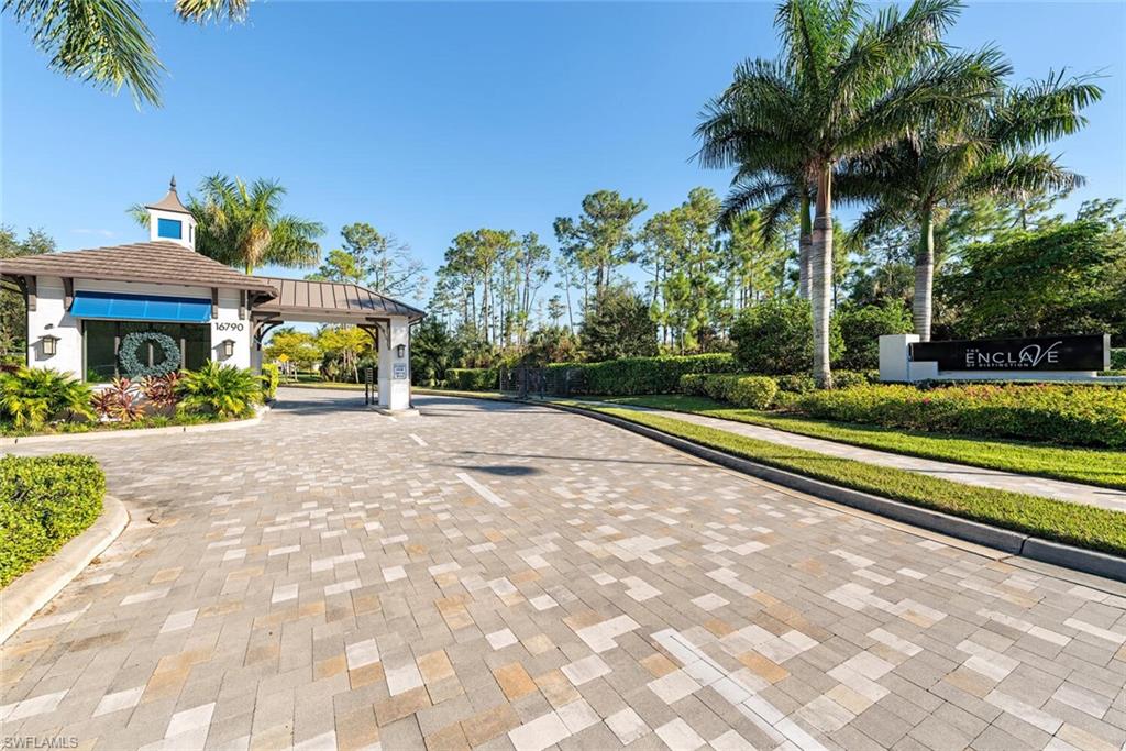 16715 Enclave Circle Naples, FL 34110 - Photo 32 of 33 a view of house with outdoor space and entertaining space