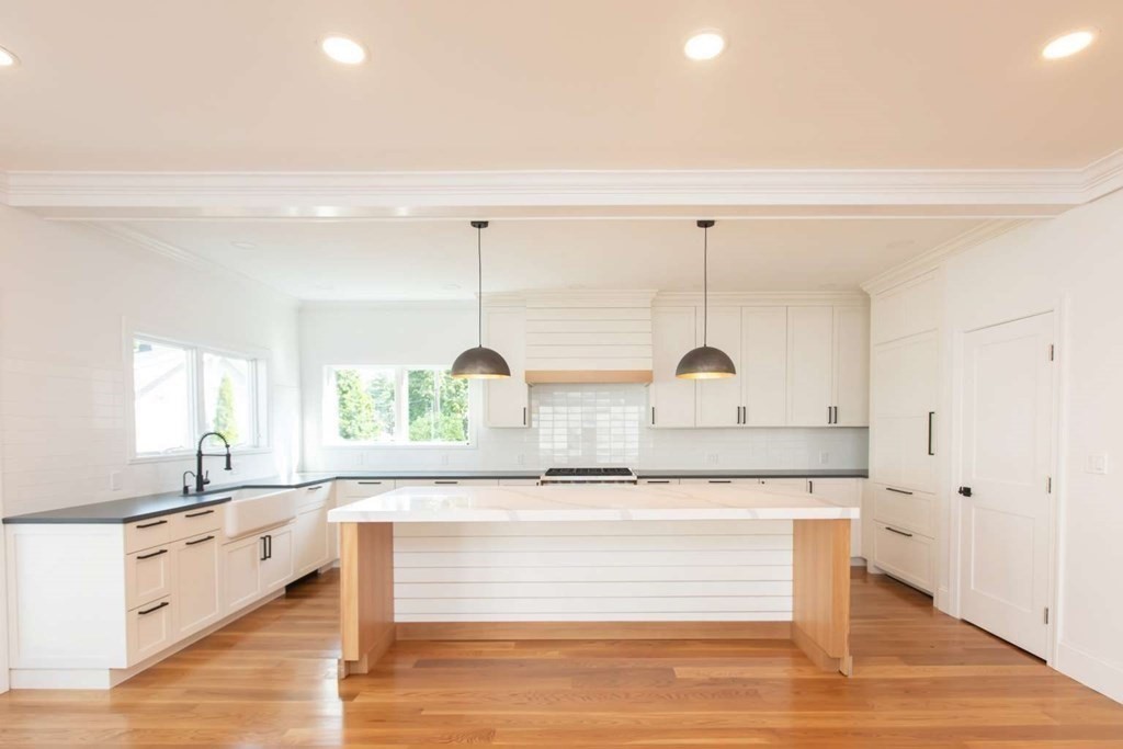 9 Wompatuck Road Hingham, MA 02043 - Photo 3 of 24 a view living room with granite countertop stainless steel appliances and window