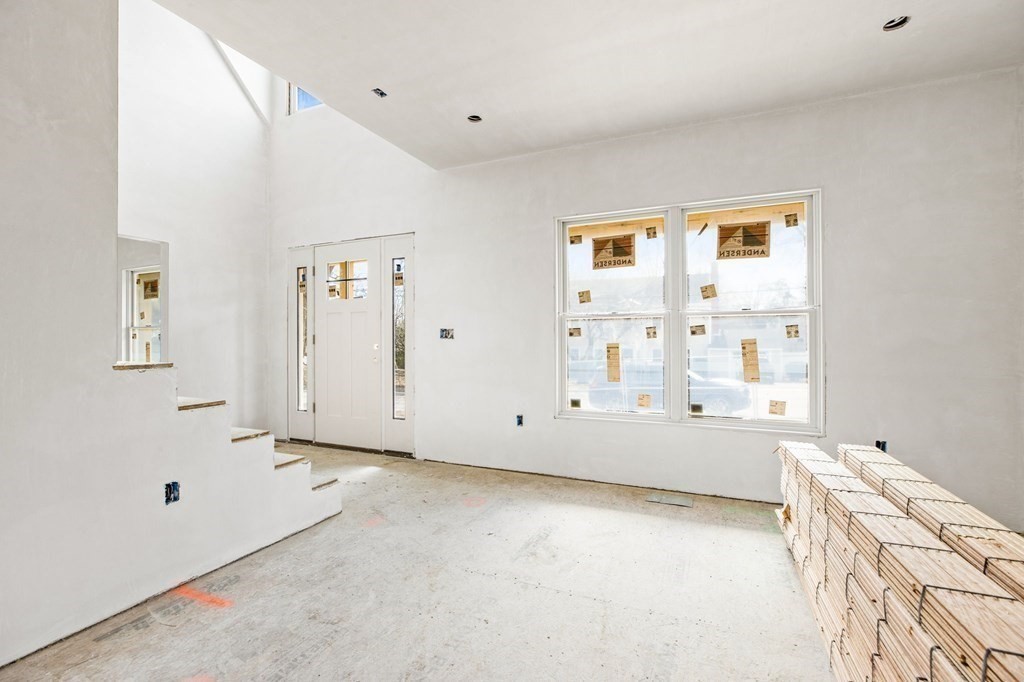 9 Wompatuck Road Hingham, MA 02043 - Photo 7 of 24 a view of an empty room with a window