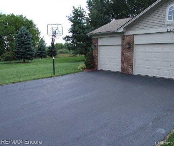 2119 Timber Ridge Court Highland, MI 48357 - Photo 22 of 22 Great space for BBall