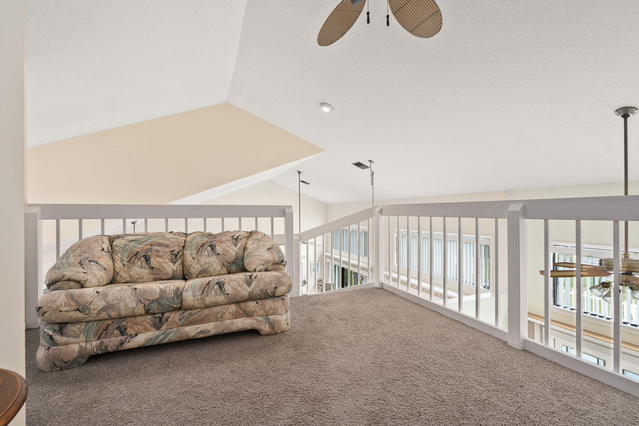 8964 Southeast Sunfish Place Hobe Sound, FL 33455 - Photo 23 of 51 a living room with furniture and white floor