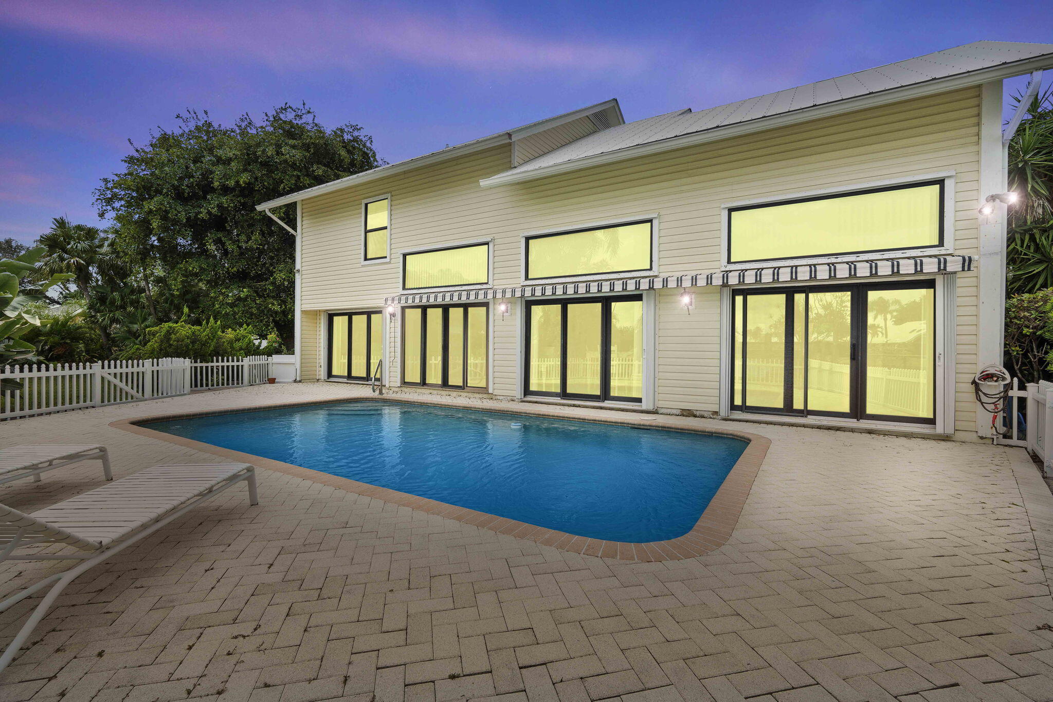 8964 Southeast Sunfish Place Hobe Sound, FL 33455 - Photo 41 of 51 a view of swimming pool with lounge chair