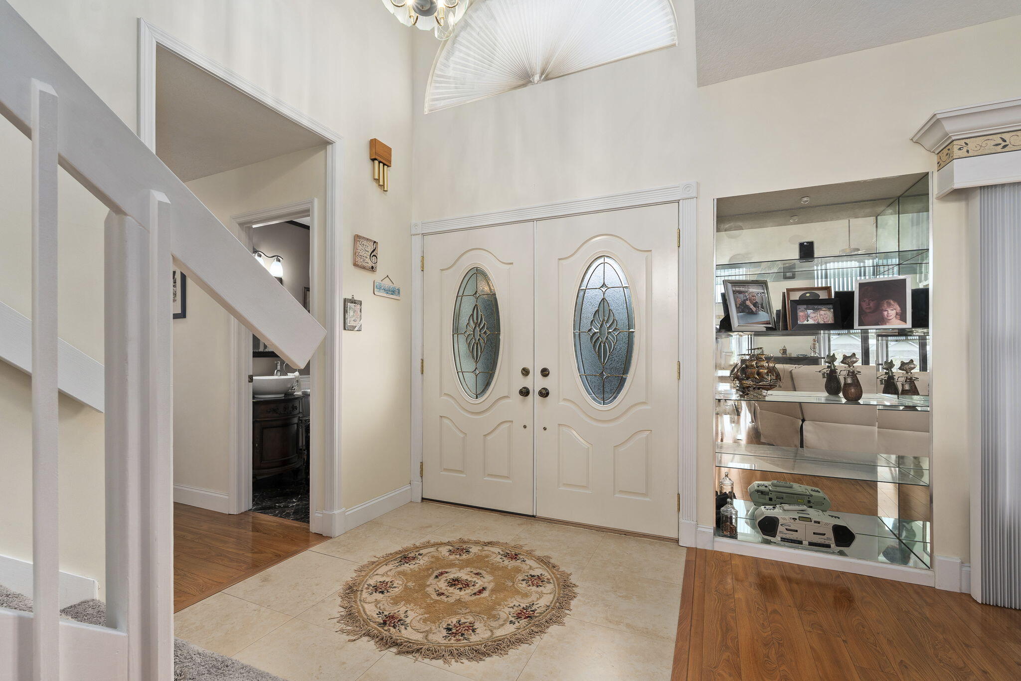 8964 Southeast Sunfish Place Hobe Sound, FL 33455 - Photo 8 of 51 a view of an entryway with wooden floor