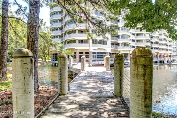 a view of sitting area with furniture and wooden deck