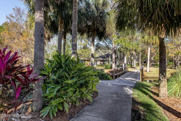 a garden view with a sitting space