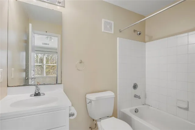 a bathroom with a sink toilet a shower and a bathtub