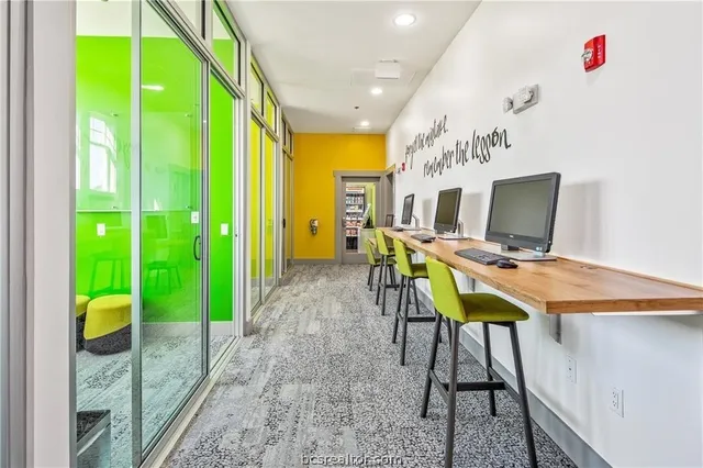 a workspace with furniture and a garden