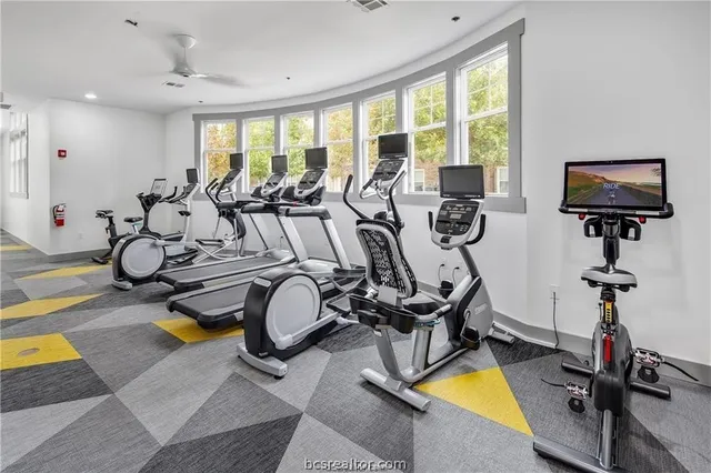 a view of a room with gym equipment