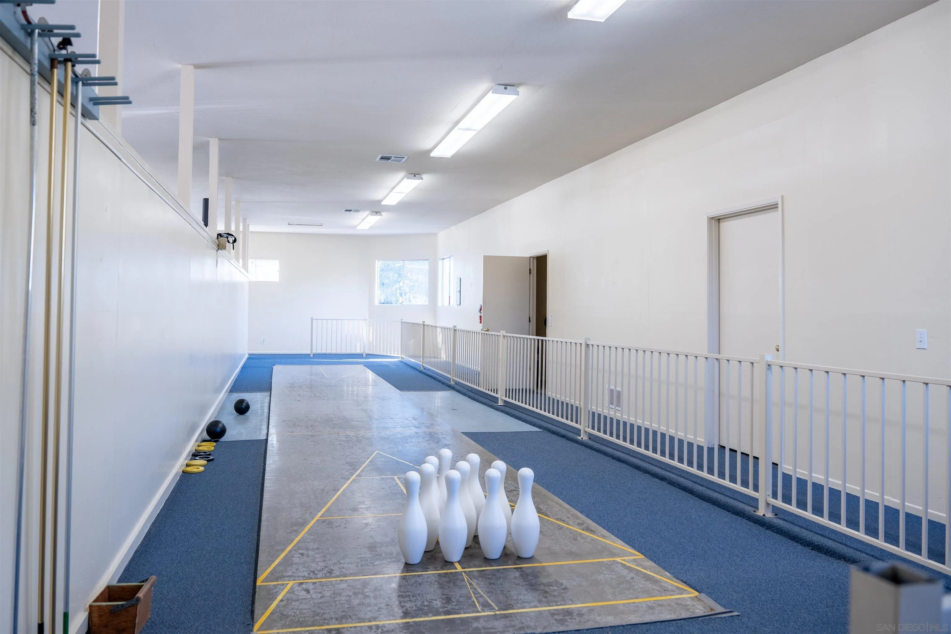 3909 Reche Road, Unit SPC 116 Fallbrook, CA 92028 - Photo 24 of 27 a view of a hallway with staircase