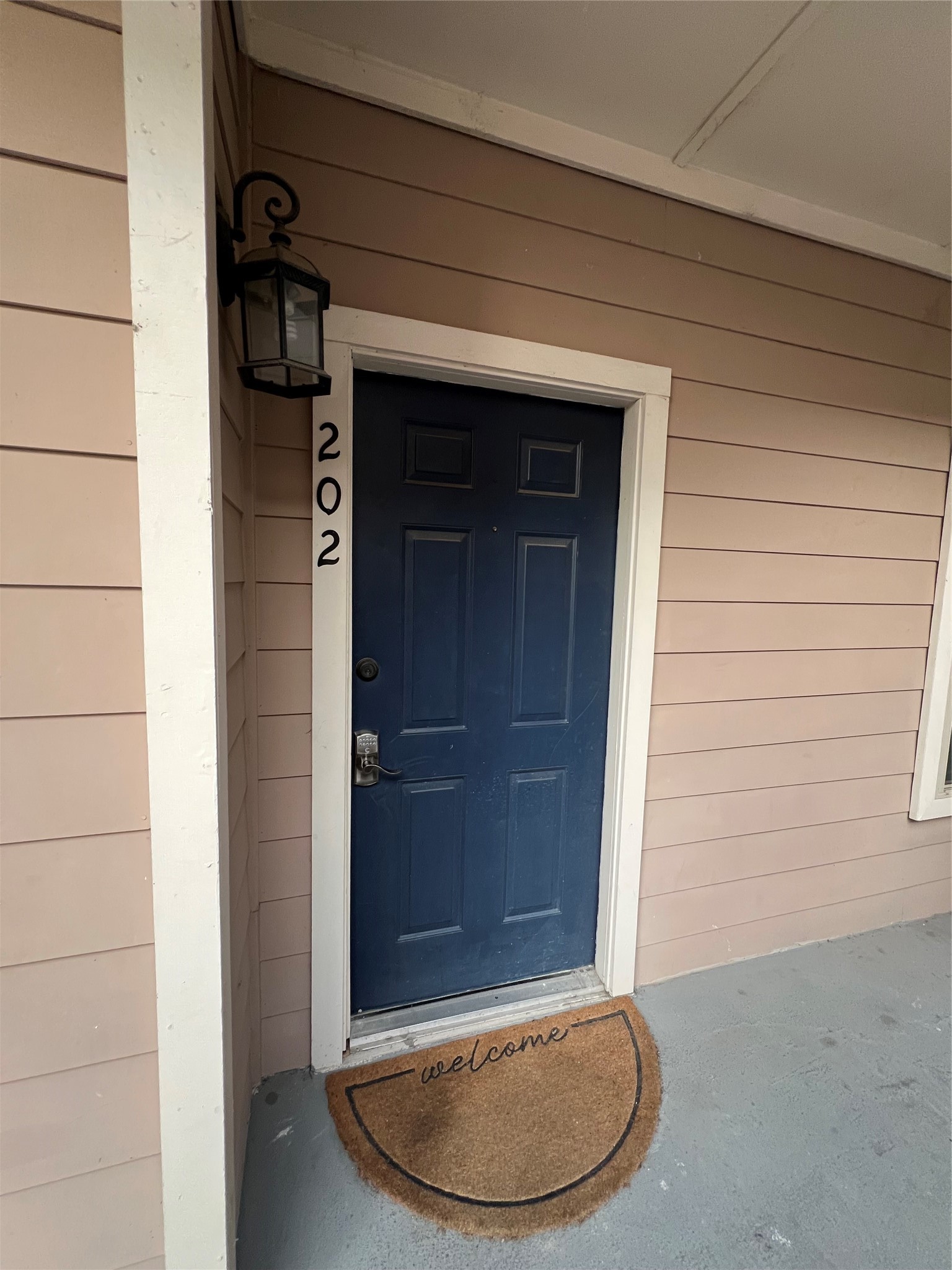 2414 Longview Street, Unit 202 Austin, TX 78705 - Photo 3 of 17 a view of a wooden door